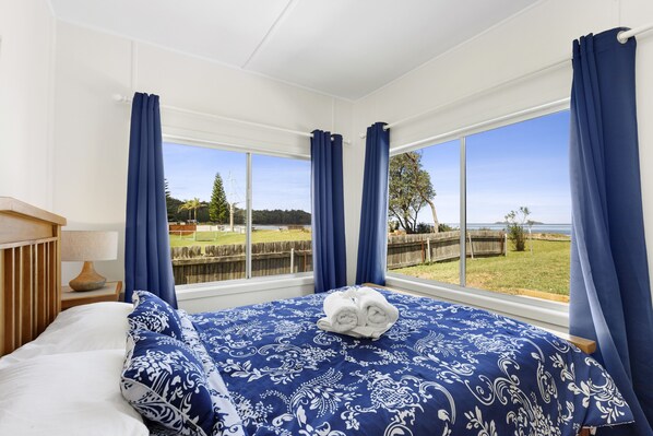 Queen bedroom - glorious views from your beachside paradise