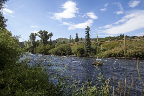 View of Roaring Fork River from back deck of condo