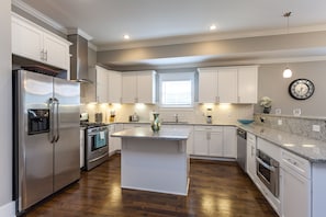 This Enormous kitchen is perfect for entertaining large gatherings.