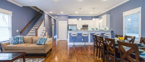 Wide open floor plan.  This room is 24 ft wide with soaring 10ft ceilings.