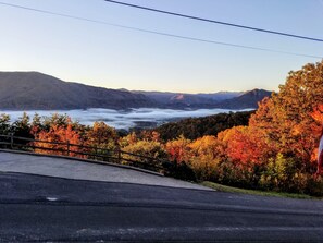 Glorious fall colors frame the morning mist over the valley--a common sight.