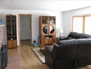 Angle of Living Room showing the Hallway when you first walk in.