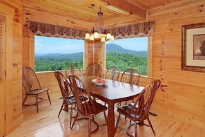 Dining with plenty of seating. There are also bar stools.