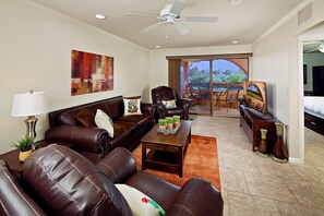 Spacious living room with stunning mountain and golf course views!