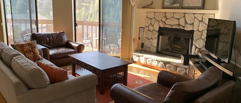 Spacious living room w/beautiful view of Diamond Peak & side view of Lake Tahoe