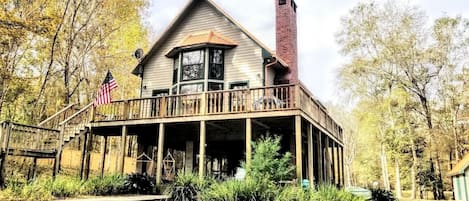 Front of house that faces the river and extended dock