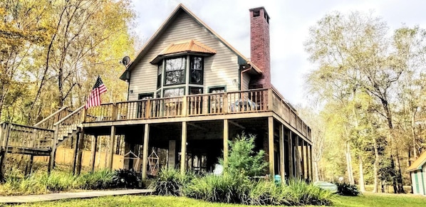 Front of house that faces the river and extended dock