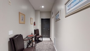 Common area with washer and dryer to the door on your right.