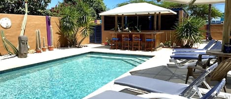 Great size pool with bar and palapa shade umbrella. New beach chairs 2023.