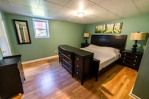 Master bedroom with king tempurpedic, 2 closets, 2 nightstands, dressers & lamps