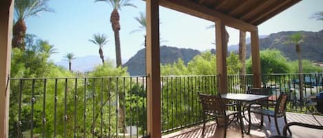 Front corner upper unit means open views of palm trees and surrounding mountains