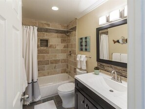 Custom guest bathroom with tub