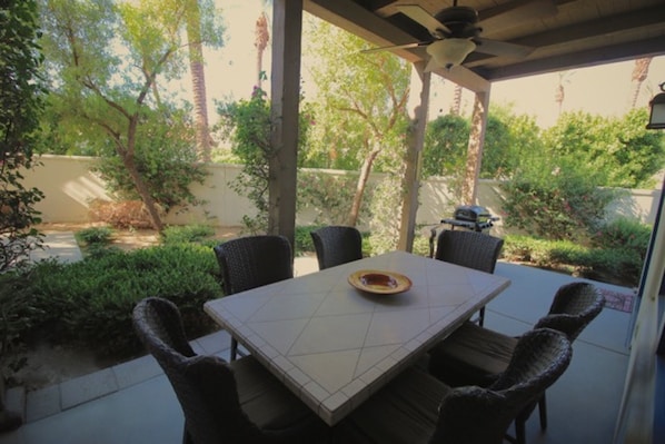 View of corner patio. Upgraded seating. Walled-in privacy.  No lookie-loos.