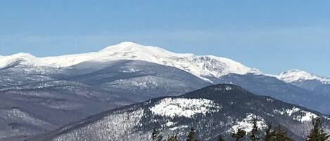 Yr round view of Mt washington from couch, dining nook, deck + swivel chairs!
