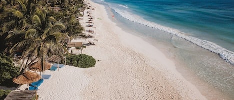 Casa Bonita enjoys a premium beachfront location in Tulum's boutique hotel area