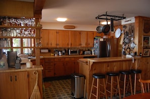 Large kitchen stocked with any tool or appliance you need