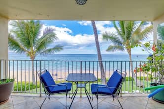 Beachfront 1-bedroom corner condo on Kameole Beach II, with two ocean views.