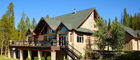 Rear of house, with pristine landscaping.