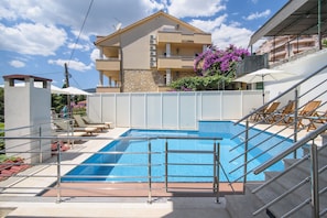 Swimming pool & sun loungers