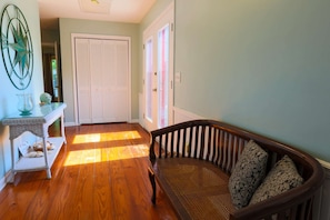 Enter the front door, turn left and walk past the couch to find the newly renovated kitchen.