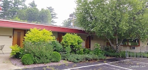 Outdoor seating area/patio tables, bike rack.