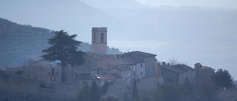 The castle rises above the valley of Spoleto