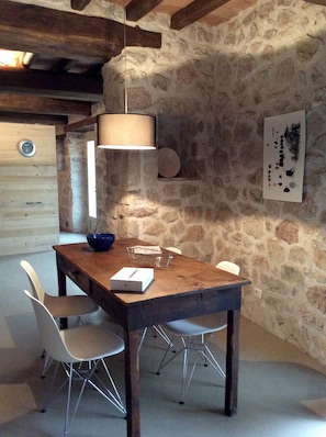 Dining area leading to kitchen