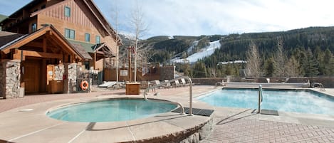 Take a dip in the outdoor hot tub and enjoy mountain views.