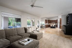 Embrace the spacious charm of our open-layout living room, offering a captivating view