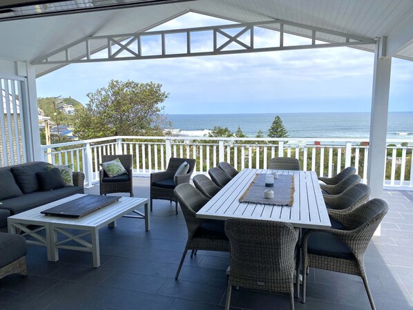 Picture yourself relaxing on the balcony with beautiful Copacabana beach below.