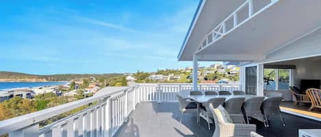 Relax or entertain on the huge top balcony overlooking the beach and ocean.