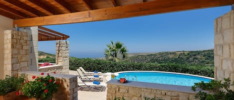 Villa Thimari - Balcony view- round swimming pool