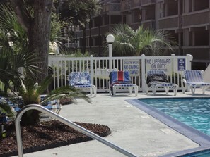 plenty of chairs on the pool deck