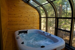 Private Jacuzzi In Unit overlooking the forest. 