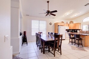 Large dining room area. Table expands to accommodate 10 place sittings.