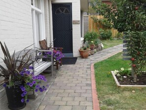 Enter via a level garden path to your front door.  