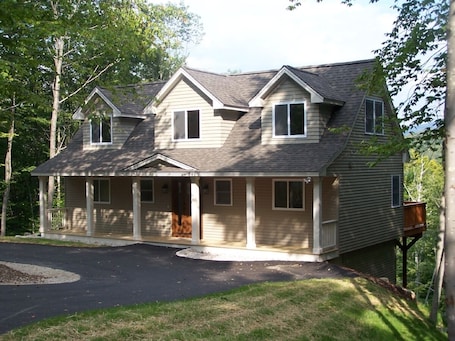 Circular drive, covered porch, beautiful view from the deck and all rooms