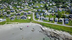 Aerial view of the compound in the middle of photo and beach