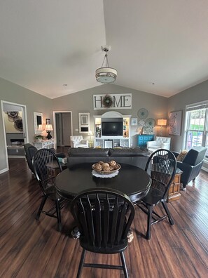 Kitchen-living room
Game table or dining seating at table 2. Extra chairs avail.