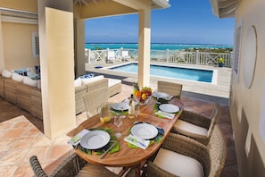 Outdoor dining by the pool