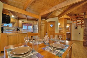 View of dining and kitchen areas.