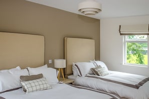 The Waterville Room features 2 Queens in a bright and airy room with en suite.