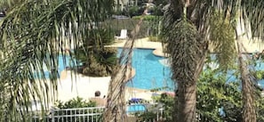 One of our beautiful pools-heated in the cold days.Plenty of lounges & umbrellas