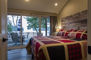 Master bedroom with a lake view