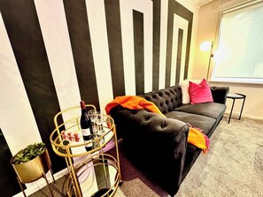 Black velvet 2.5 seater sofa