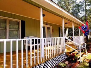 A covered deck- great place to enjoy a morning coffee, rain or shine. 