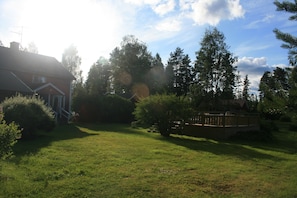 The main house and new decking area from the garden