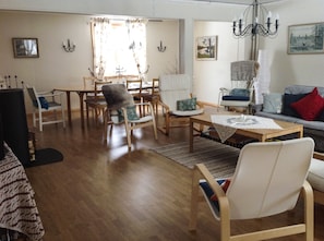 The lounge/dining area,seats 8-10 comfortably Woodburner stove views-lake/garde