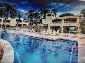 Relax around our pool and spa with ocean views