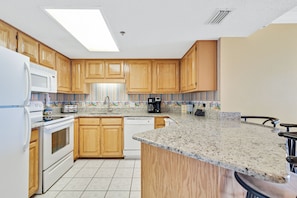 Fully Equipped, Upgraded Kitchen with Granite Counter Tops and a Breakfast Bar